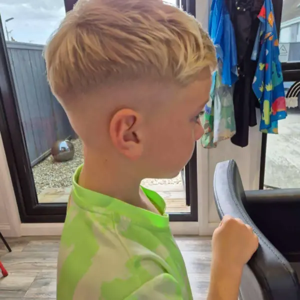 Boys haircut with skin fade, rear view
