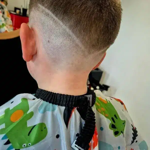 Low skin fade with textured top, rear view