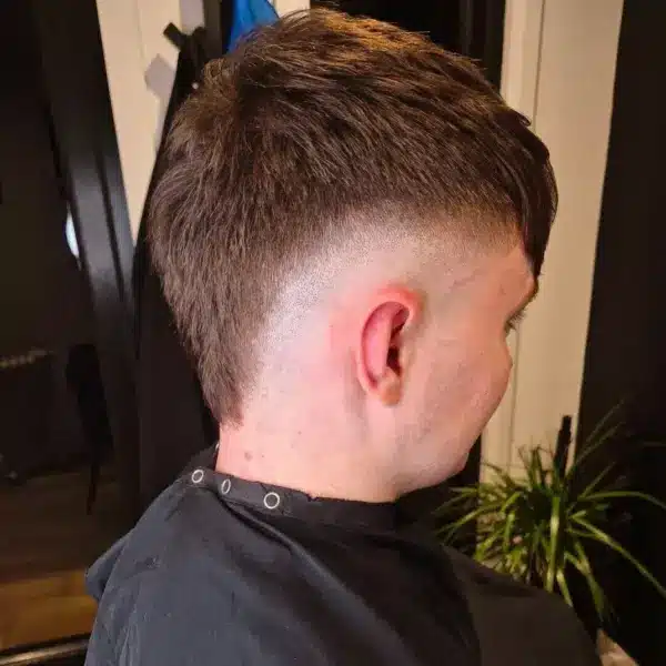 Boys short back and sides with taper, rear view