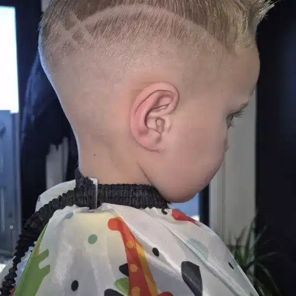 High skin fade with close crop, side view